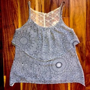 Flowing, geometric design tank top with ivory lace back; size medium